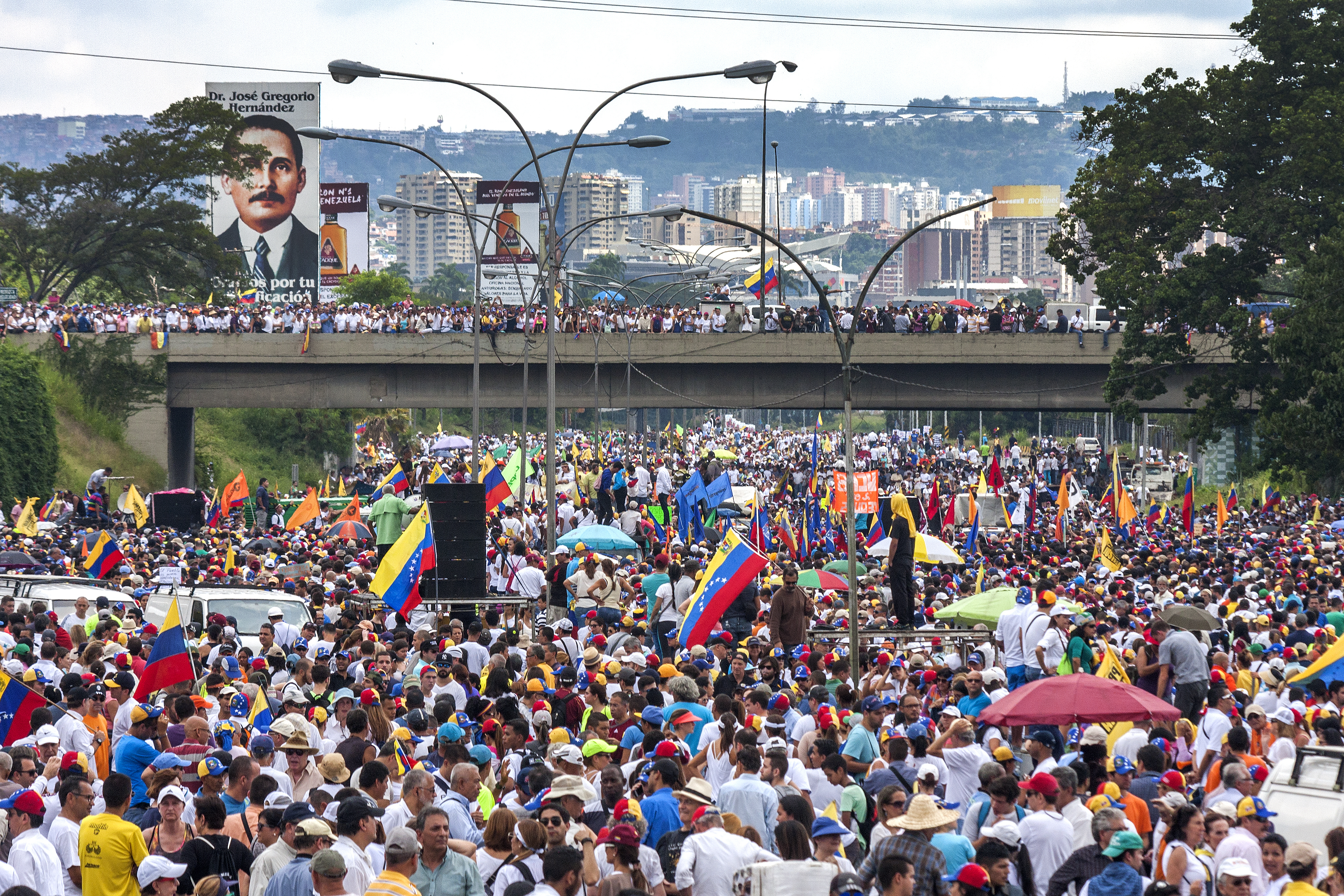 Demonstrators concentration against referendum cancellation. Caracas, Venezuela - October 26, 2016. Demonstrators concentrated protesting in Francisco Fajardo highway in Caracas against the cancellation of a constitutional referendum to revoke Venezuelan president in charge.